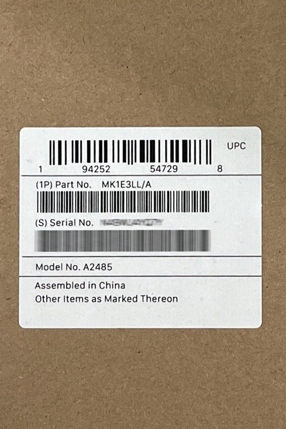 A white label with black bar code

Description automatically generated